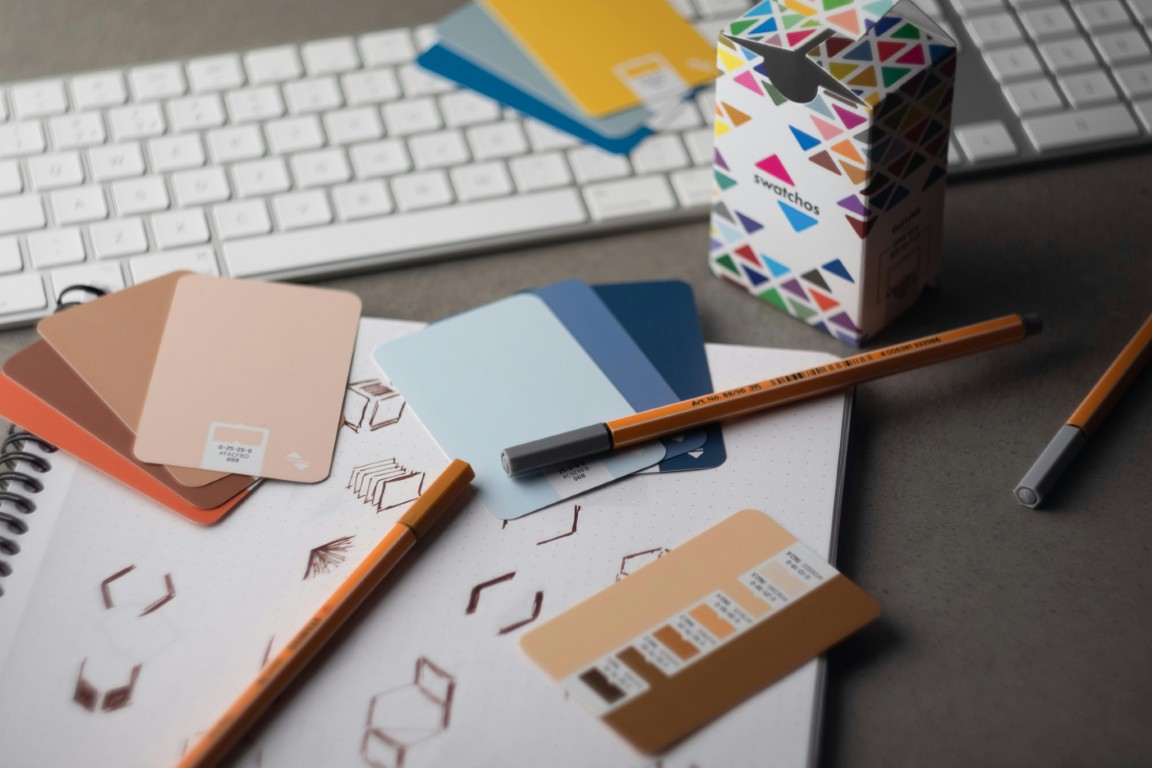 Professional brand identity package showing logo design, business cards, and brand guidelines